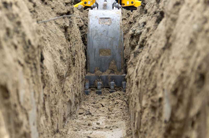 Backhoe Trenching